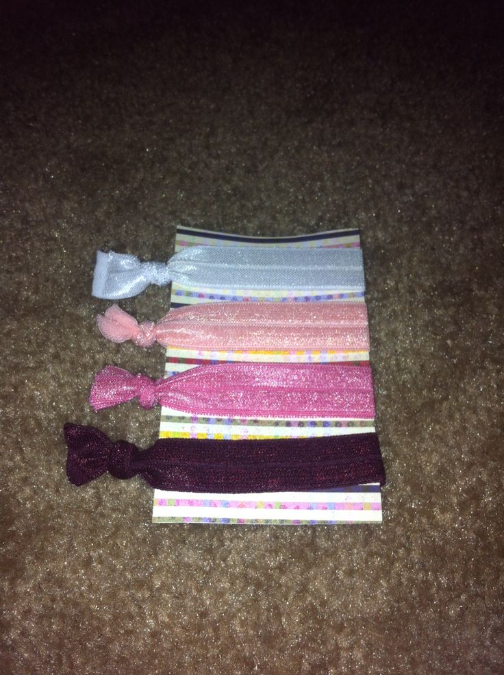 4 handmade elastic hairties. Www.etsy.com/shop/pearlsnstitches